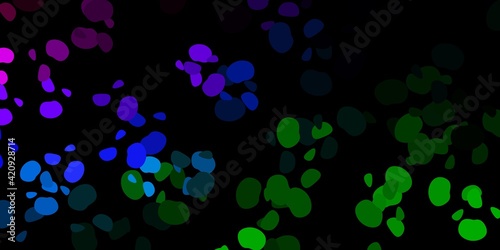 Dark multicolor vector backdrop with chaotic shapes.