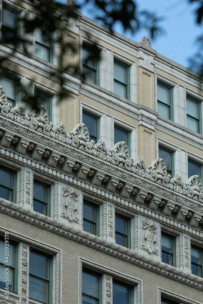 Washington, DC, USA - 29 June 2020: Beautifully decorated Facade of a historic Apartment Building Washington, DC, USA - 29 June 2020: Beautifully decorated Facade of a historic Apartment Building