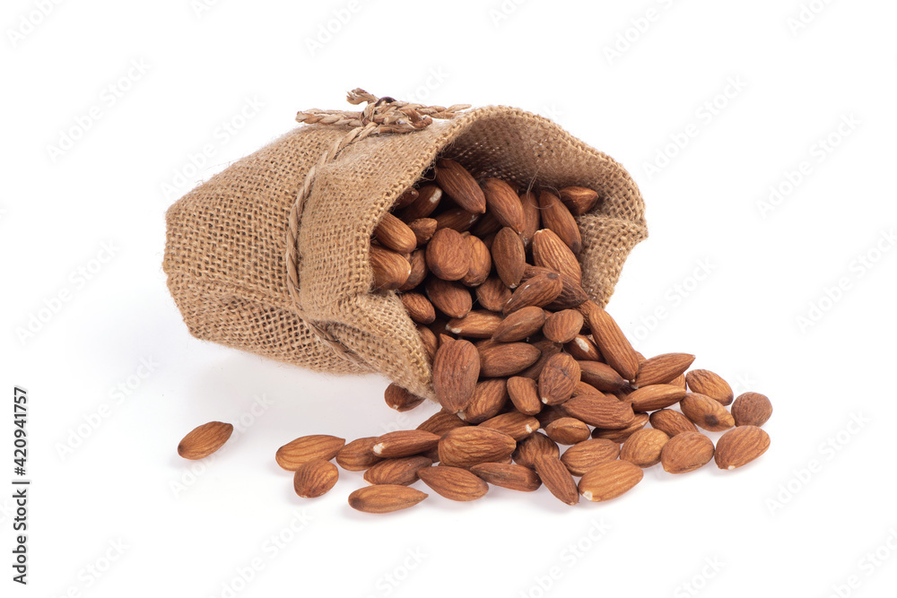 Almond dried seeds isolated on white background.