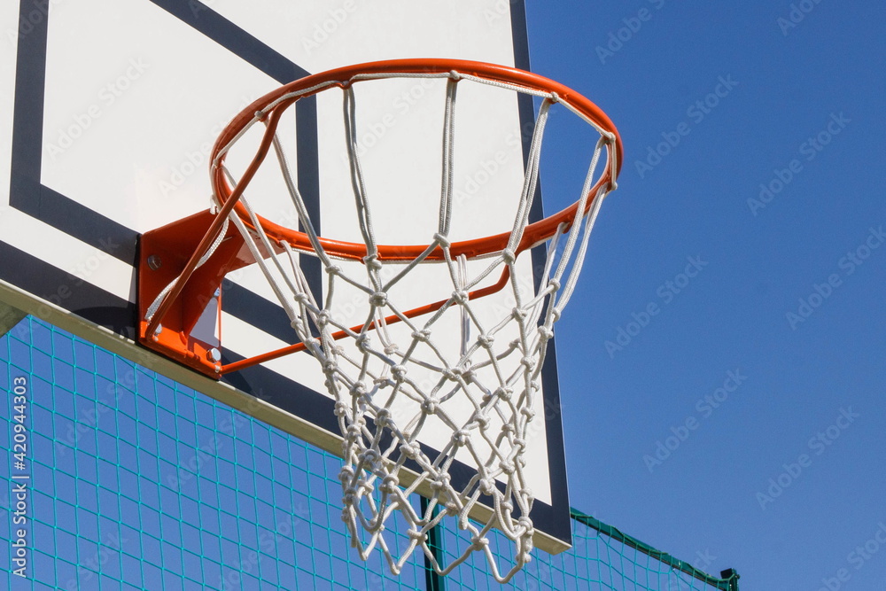 Basketball board with hoop. Sport and recreation time