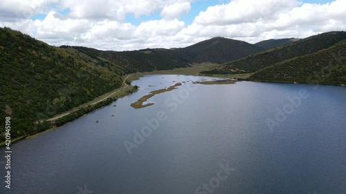 Shudu lake fly over drone footage at Potatso National Park Yunnan China photo