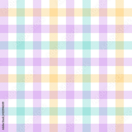 Vichy check pattern in pastel purple, green, yellow. white. Spring summer light bright textured gingham tartan plaid for tablecloth, skirt, picnic blanket, other modern fashion fabric or paper print.