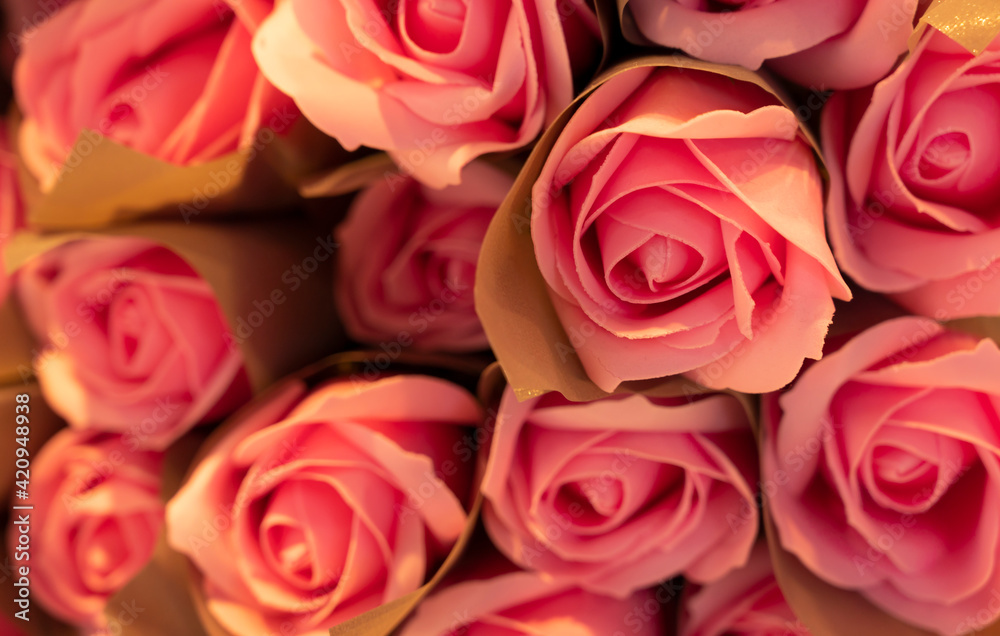 A large bouquet of multicolored roses in a soft and blurry style for the background A large bouquet of multicolored roses in a soft and blurry style for the background