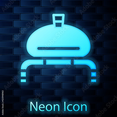 Glowing neon Bread and salt on towel icon isolated on brick wall background. National food loaf. Traditional ukrainian wedding bread. Vector