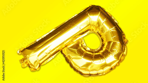 gold P letter on yellow background