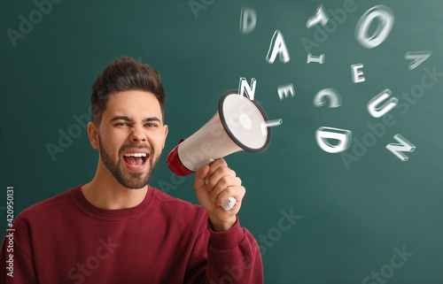 Male student with megaphone...