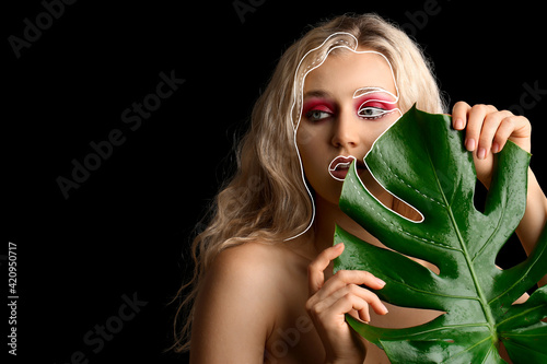 Beautiful young woman with ...