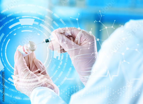 Doctor with vaccine for imm...