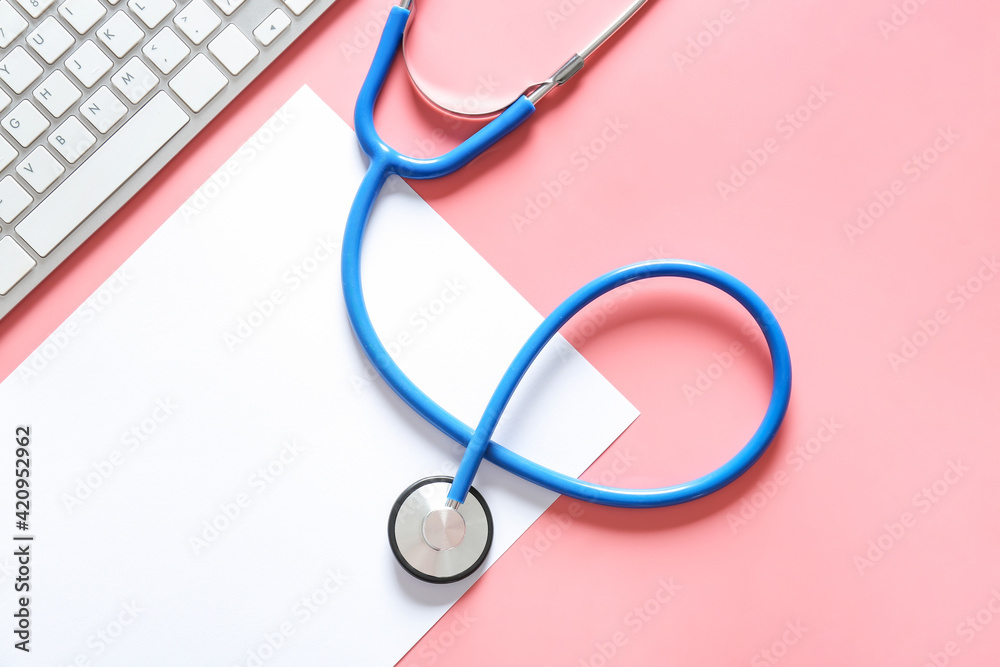 Stethoscope, keyboard and sheet of paper on color background Stethoscope, keyboard and sheet of paper on color background