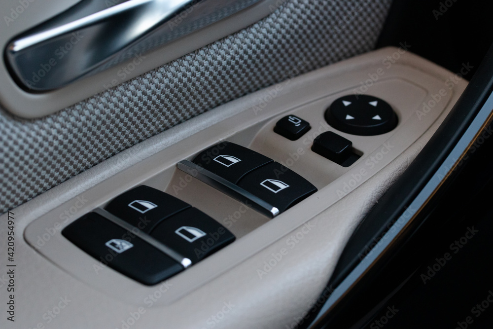 Obraz premium Details of electric windows orders.Beige interior.