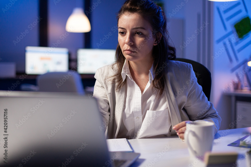 Pov of businesswoman looking in camera during online videocall conference, talking with teamates for rise profit. Manager analysing marketing statistics late at night in business office Pov of businesswoman looking in camera during online videocall conference, talking with teamates for rise profit. Manager analysing marketing statistics late at night in business office