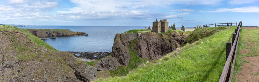 Panoramic image of Dunnottar Castle is a ruined medieval fortress located upon a rocky headland on the northeastern coast of Scotland