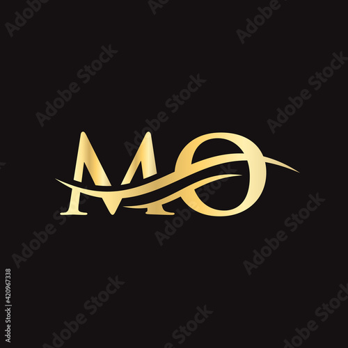 Initial MO letter linked logo vector template. Swoosh letter MO logo design. MO Logo design vector photo