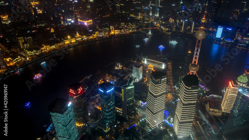 A night view from Shanghai tower to the modern skyline in Shanghai, China.