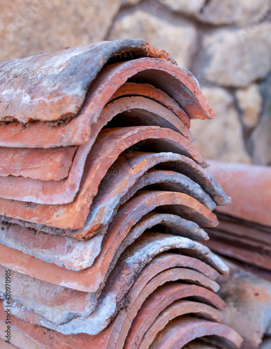 Fotografie Packs of reused mediterranean roof tiles or monk and nun
