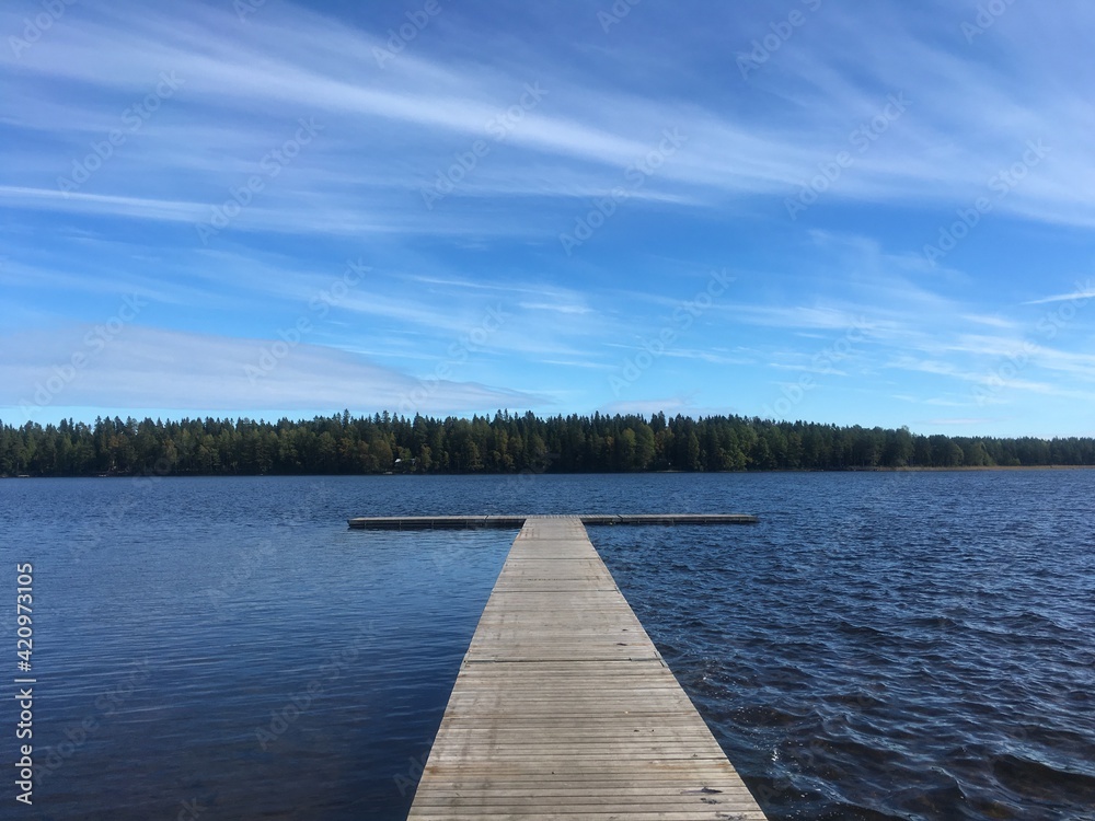 Obraz premium Wooden pier on the lake in Northern Sweden