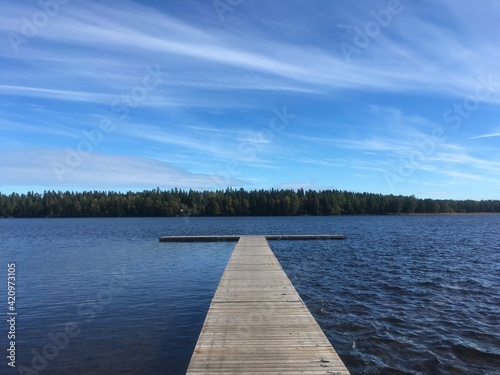 Fototapeta Naklejka Na Ścianę i Meble -  Wooden pier on the lake in Northern Sweden