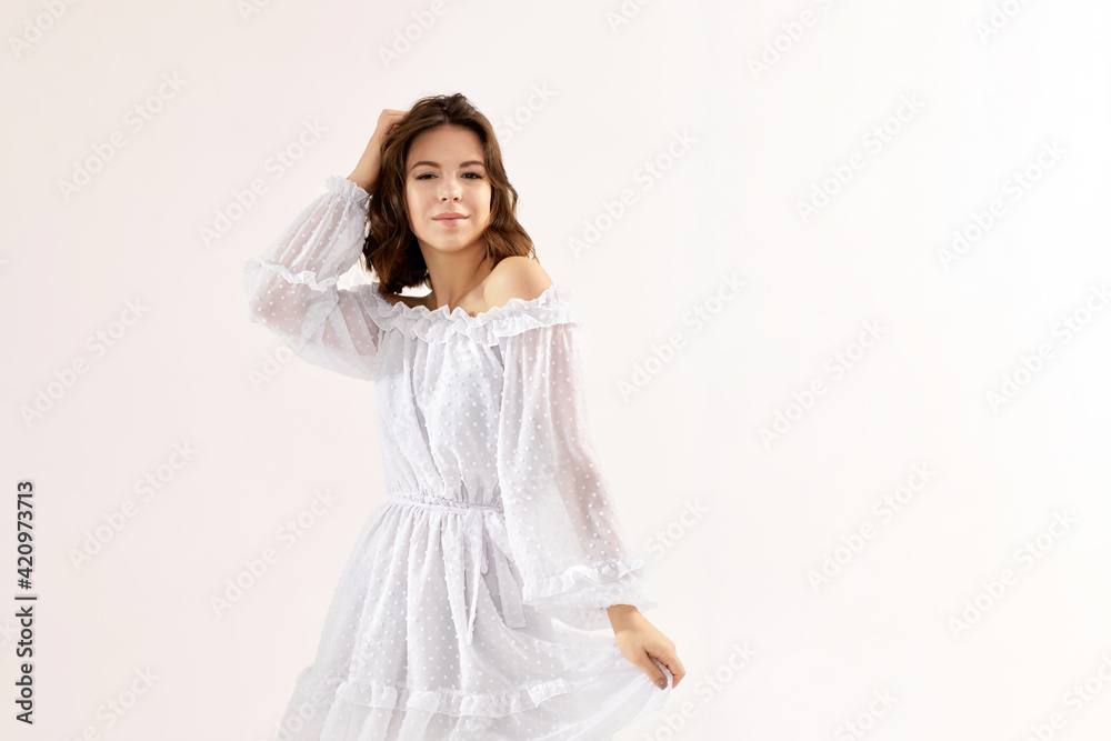 beautiful young brunette woman in white dress beautiful young brunette woman in white dress