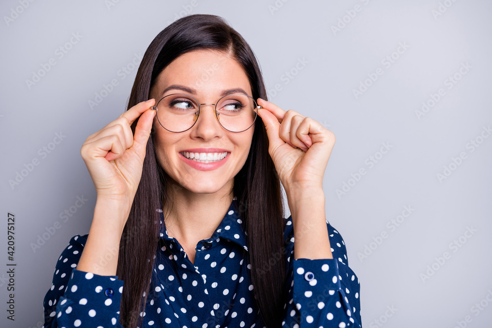 Photo of optimistic brunette girl look empty space wear spectacles blue blouse trousers isolated on grey color background Photo of optimistic brunette girl look empty space wear spectacles blue blouse trousers isolated on grey color background