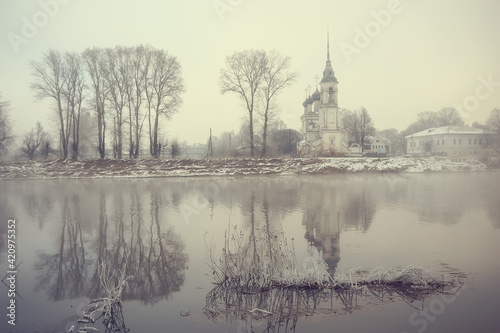 winter landscape church on the banks of the freezing river in vologda  christianity baptism russia christmas