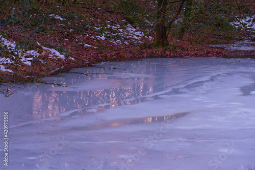 Clean ice sunset reflection