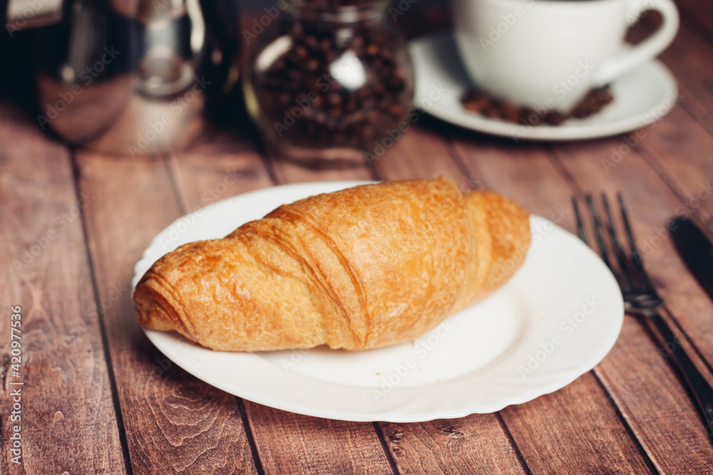 croissant in a plate on the table kitchenware breakfast meal dessert croissant in a plate on the table kitchenware breakfast meal dessert