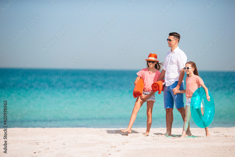 Portrait of family in summer on the seashore Portrait of family in summer on the seashore