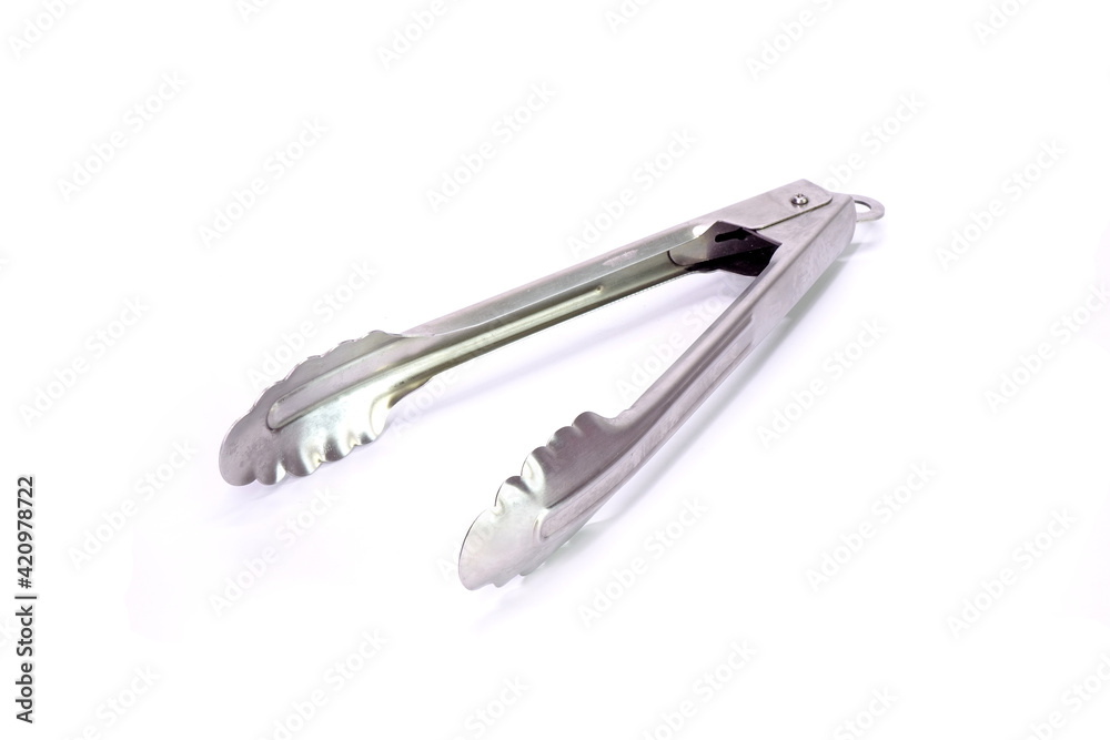 Serving kitchen tongs isolated on white background Serving kitchen tongs isolated on white background
