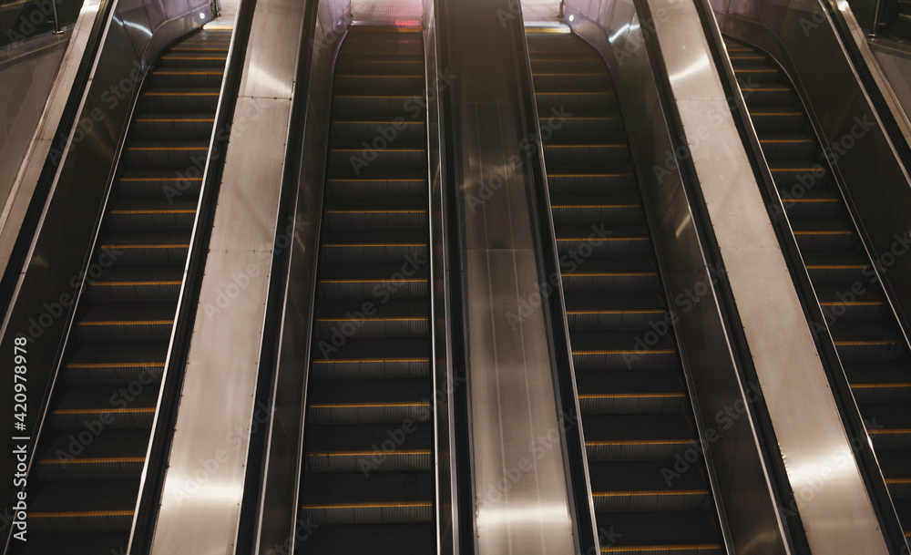working escalator at the airport working escalator at the airport