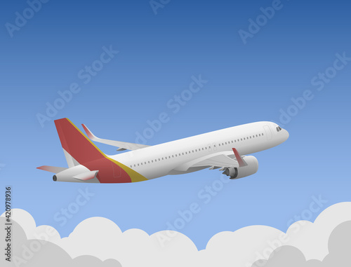 The red and yellow plane shot above the clouds