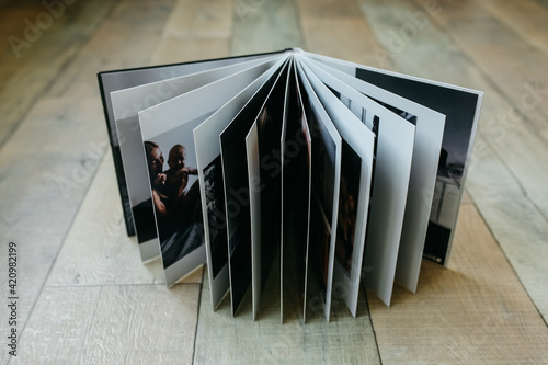 example of a family photo book, high-quality photo print, spread of the book, store memories beautifully in a family album