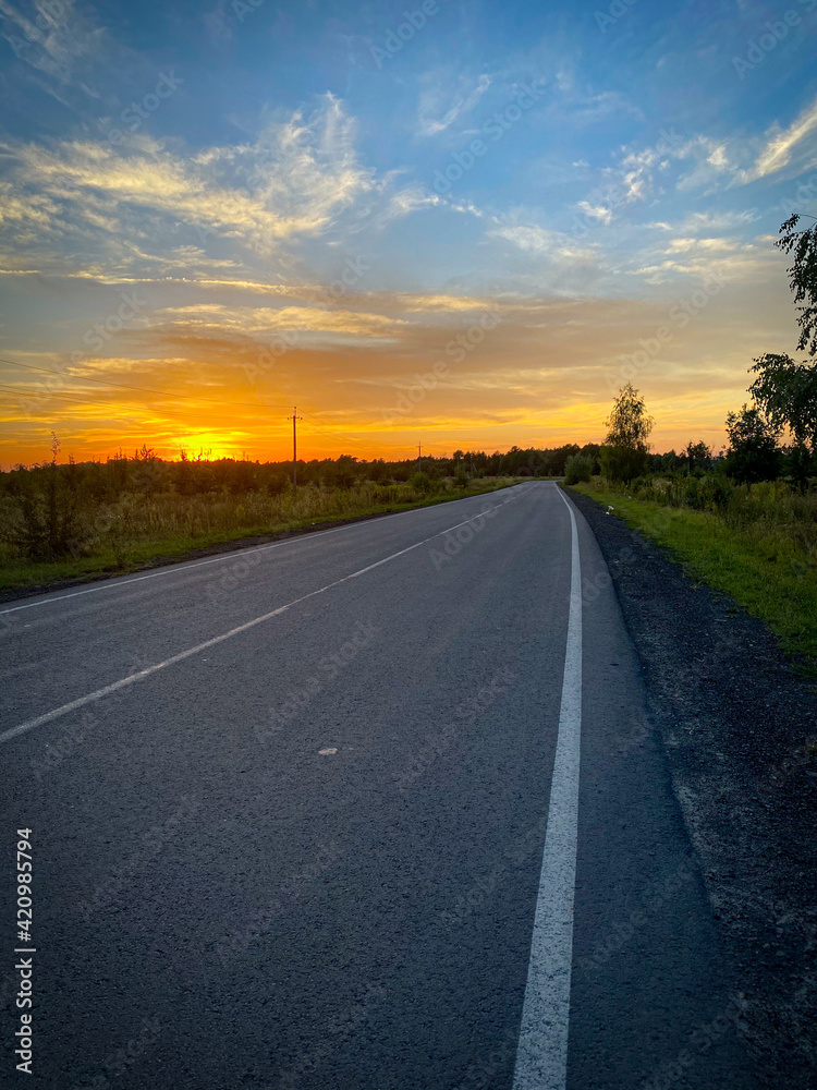 sunset on the road