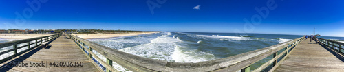 St Augustine Beach Wooden Pier on a beautiful sunny winter day - Panoramic view