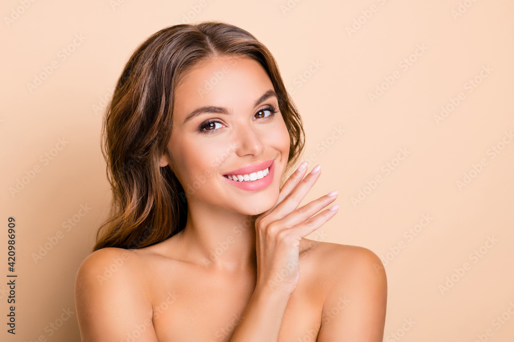 Photo of nice long hairdo optimistic lady without clothes hand face isolated on pastel beige color background - obrazy, fototapety, plakaty 