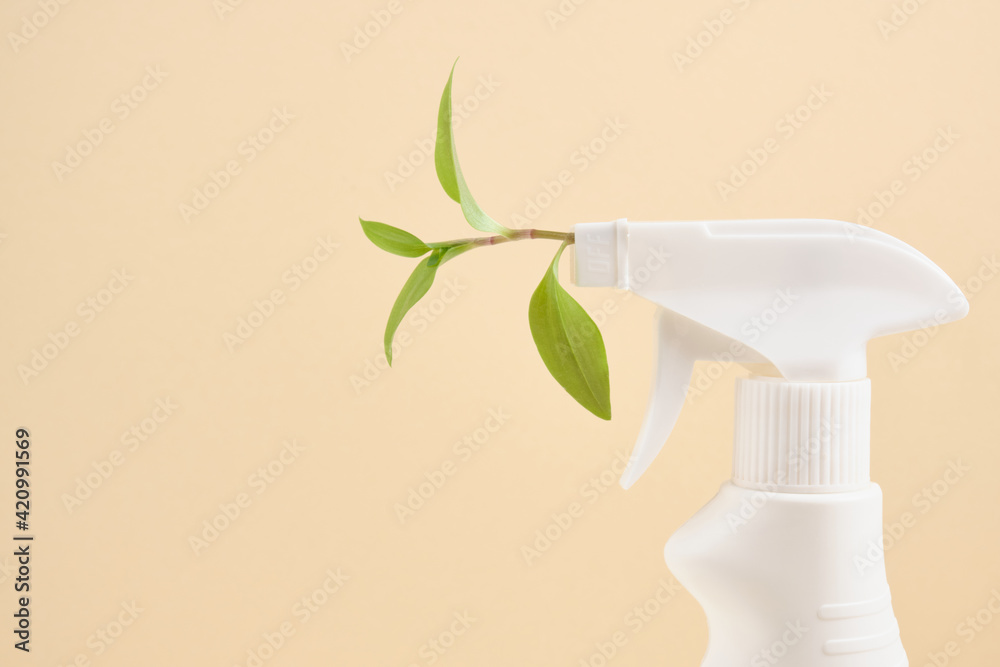 Spray bottle with leaf spray for eco friendly natural cleaning concepts. Spray bottle with leaf spray for eco friendly natural cleaning concepts.