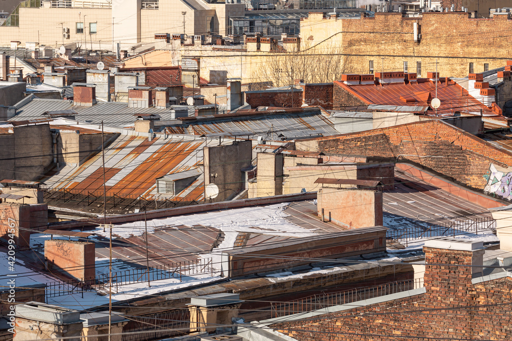 Roofs on the old buildings in the city center in Saint Petersburg, Russia. Roofs on the old buildings in the city center in Saint Petersburg, Russia.