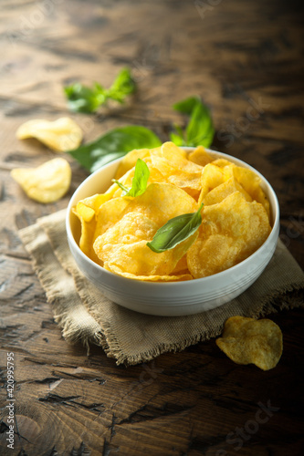 Potato chips in a white bowl