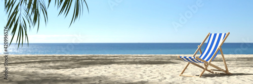 Fototapeta Naklejka Na Ścianę i Meble -  Leerer Strand mit Strandliege im Sommer in der Karibik