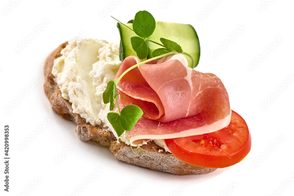 Sandwich with cream cheese and jamon, close-up, isolated on white background