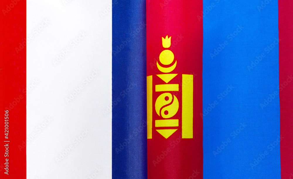 Naklejka premium fragments of the national flags of France and Mongolia close-up