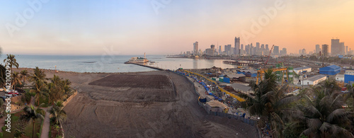 Panoramic view of early stage construction for mumbai coastal road at haji ali at sunrise