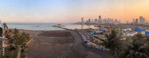 Panoramic view of construction for mumbai coastal road at haji ali at sunrise photo