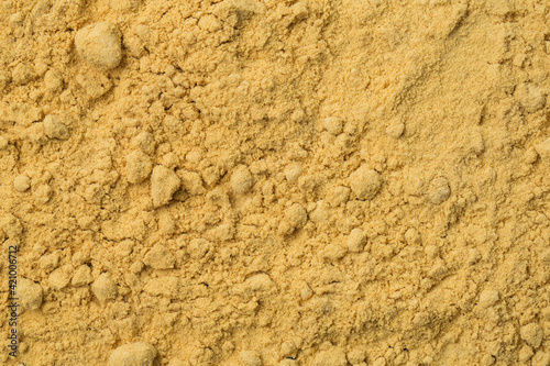 Mustard powder on black background
