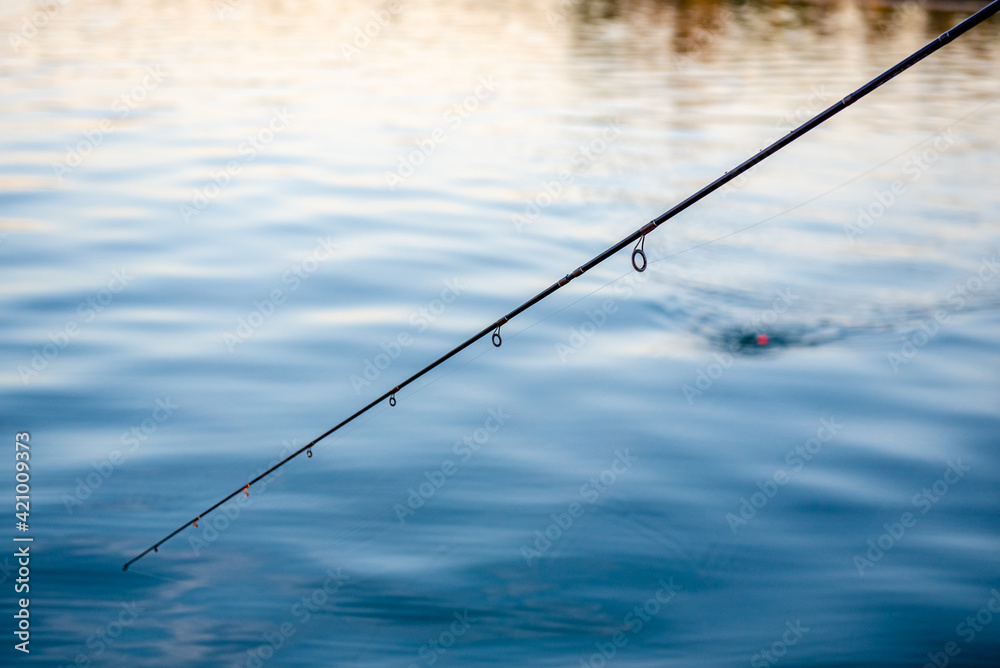 fishing rod and river, close up fishing rod and river, close up