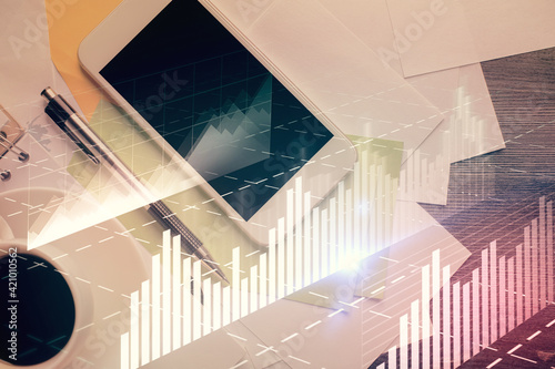 Wallpaper Mural Multi exposure of forex graph hologram over desktop with phone. Top view. Mobile trade platform concept. Torontodigital.ca