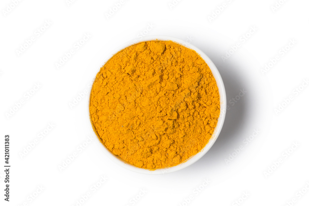 Turmeric powder close up in studio Turmeric powder close up in studio