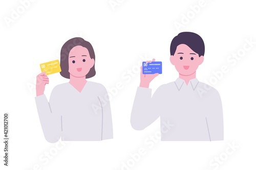 クレジットカードを持った笑顔の男女