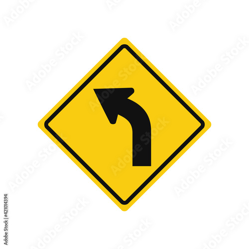 Rhomboid traffic signal in yellow and black, isolated on white background. Warning of sharp left curve