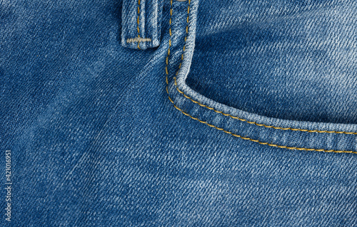 front pocket of blue classic jeans, full frame