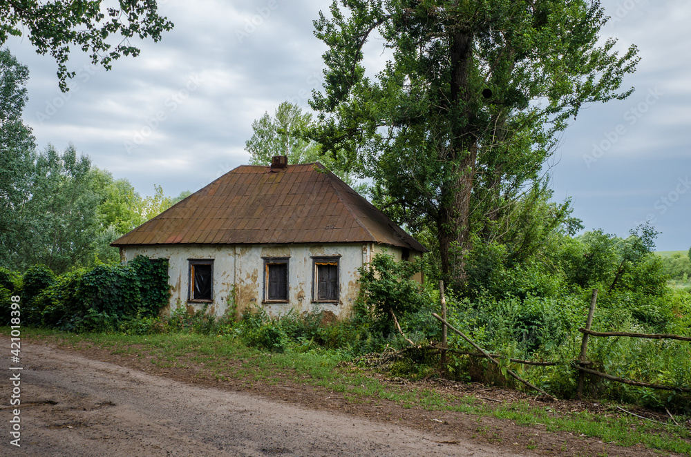 Old abandoned house on the outskirts of the village